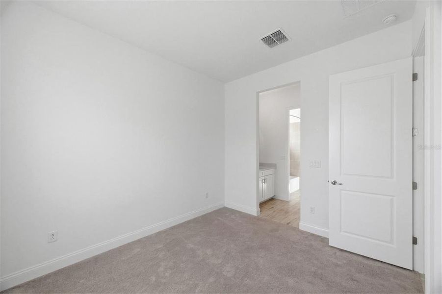Spacious, unfurnished interior of a new home in Tamarack at Two Rivers, Zephyrhills (Image 48).