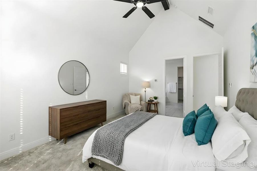 Carpeted bedroom featuring baseboards and ceiling fan Carpeted bedroom featuring baseboards and ceiling fan