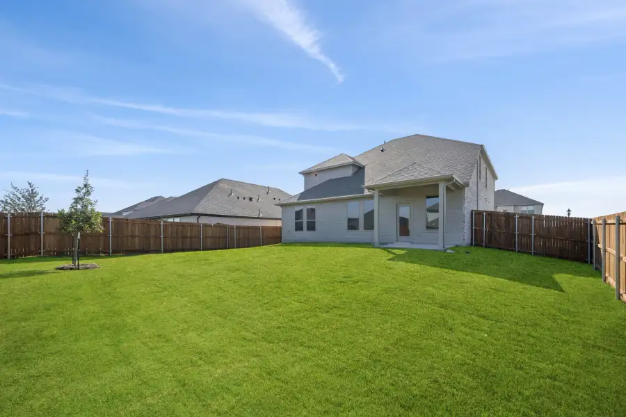 Covered Patio in the Masters home plan by Trophy Signature Homes – REPRESENTATIVE PHOTO Covered Patio in the Masters home plan by Trophy Signature Homes – REPRESENTATIVE PHOTO