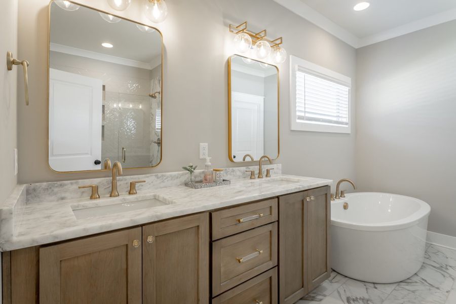 Furnished interior in a model home at Baker Road in Birchwood (Image 9).