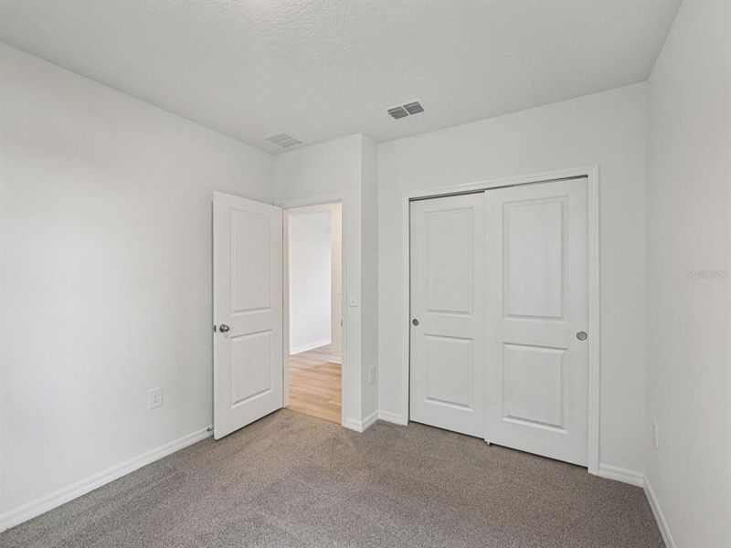 Spacious, unfurnished interior of a new home in Magnolia Bay - Premier Series, Nokomis (Image 16).