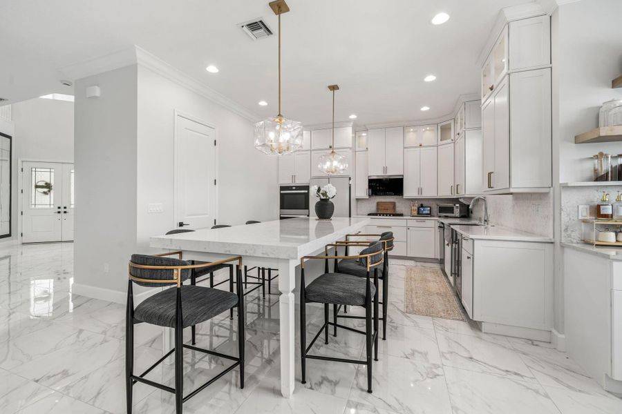 Furnished interior view inside a new home in , The Acreage (Image 4). Furnished interior view inside a new home in , The Acreage (Image 4).