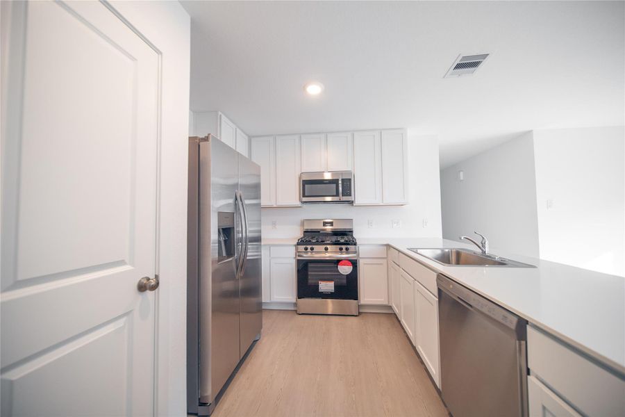 Furnished interior view inside a new home in Anniston: Watermill Collection, Katy (Image 2).