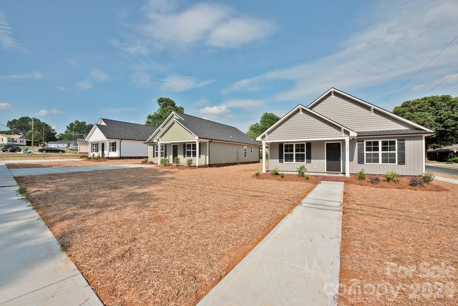 Front exterior of a new home in , Landis, NC, highlighting curb appeal (Image 16).