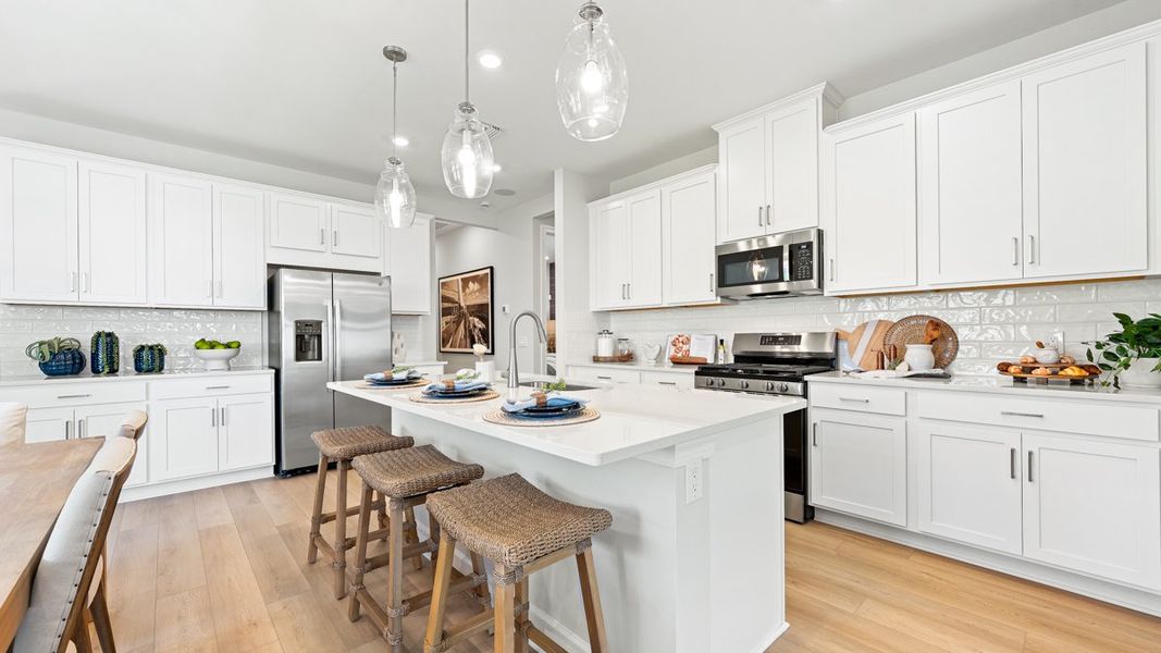 Representative furnished interior of a home built from the Alta by Taylor Morrison in Esplanade at Wellen Park, Englewood (Image 9).