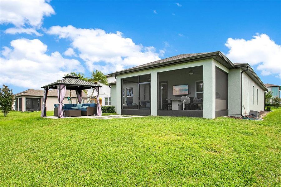 Exterior details and patio area of a home in , Deltona (Image 3).