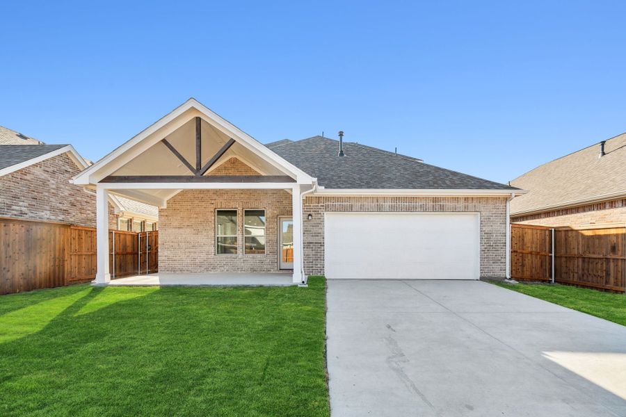 Front exterior of a new home in Dove Hollow, Waxahachie, TX, highlighting curb appeal (Image 19).