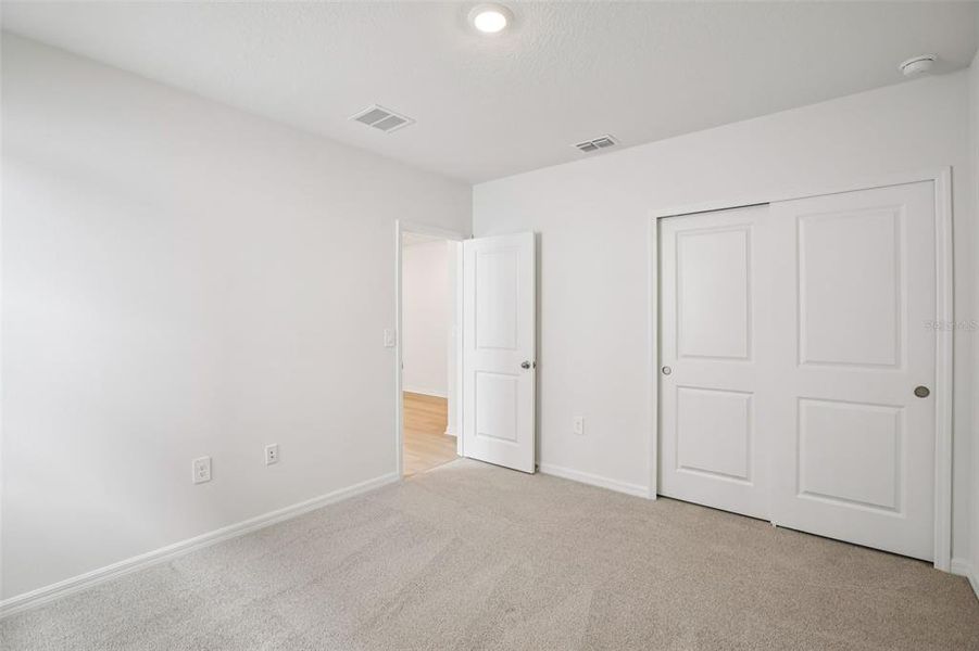 Spacious, unfurnished interior of a new home in Two Rivers - Classic Series, Zephyrhills (Image 18).