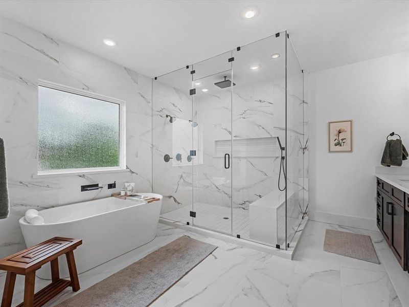 Your luxurious primary bath has everything you can imagine.