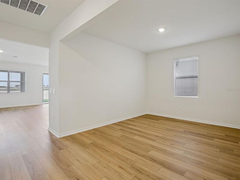 Spacious, unfurnished interior of a new home in Coasterra - Reserve Series, Palmetto (Image 18).