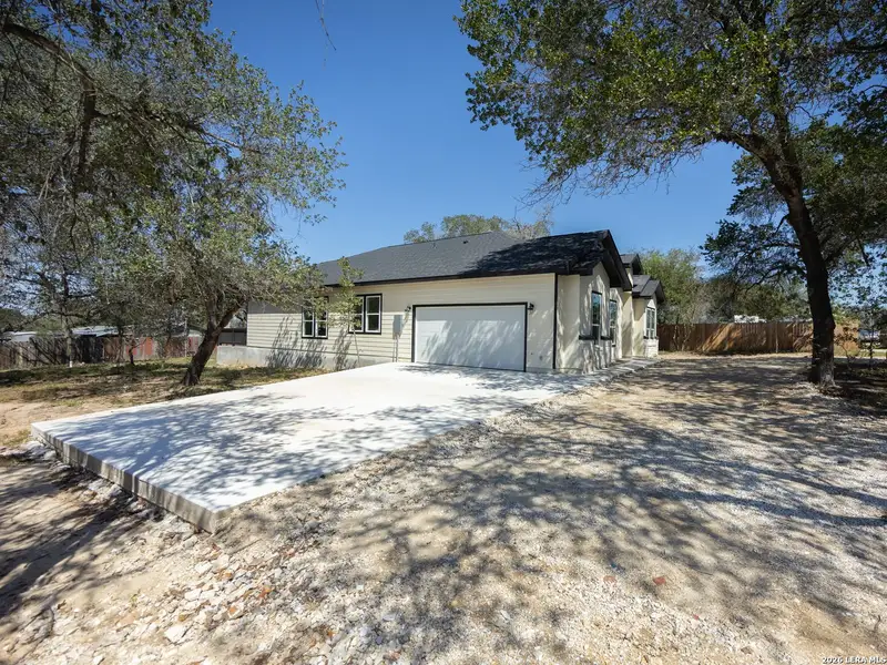 Exterior details and patio area of a home in , Elmendorf (Image 31).