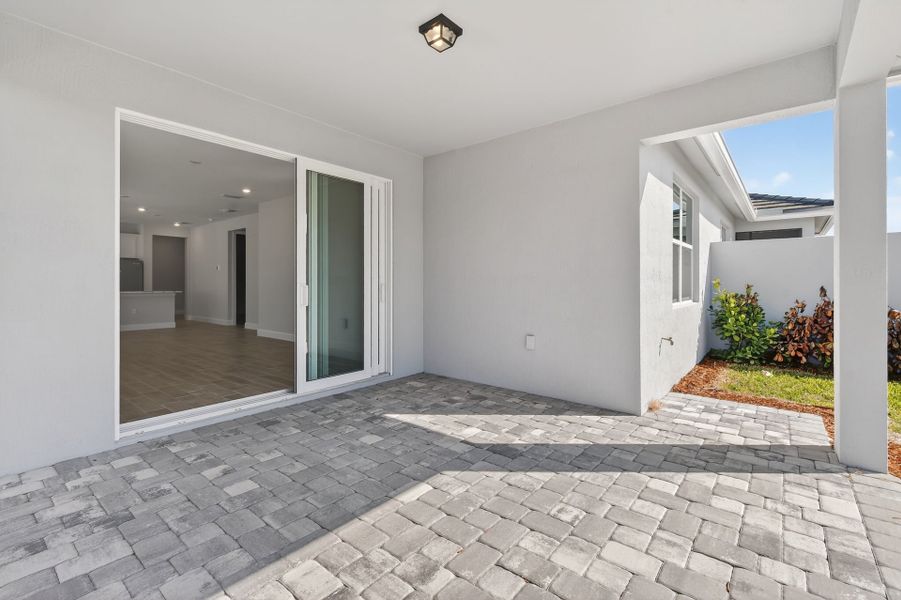 Exterior details and patio area of a home in Costa Pointe, Vero Beach (Image 36).