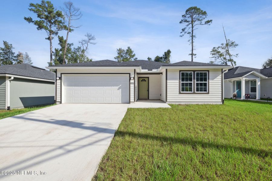 Front exterior of a new home in , Jacksonville, FL, highlighting curb appeal (Image 1). Front exterior of a new home in , Jacksonville, FL, highlighting curb appeal (Image 1).
