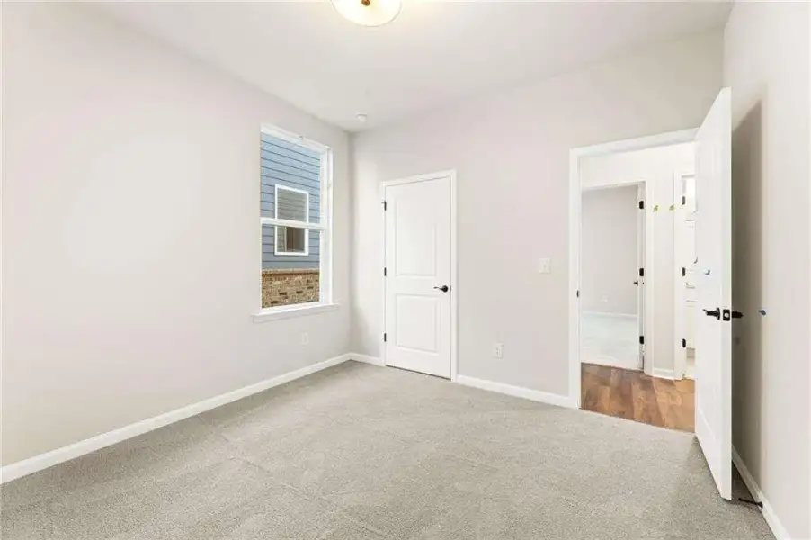 Spacious, unfurnished interior of a new home in Kelly Preserve, Loganville (Image 19). Spacious, unfurnished interior of a new home in Kelly Preserve, Loganville (Image 19).