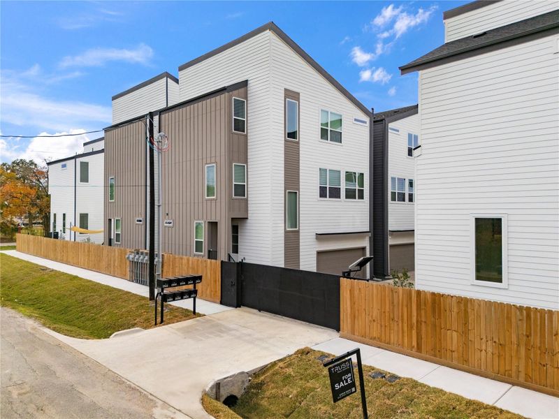 This gated community offers peace of mind and privacy in a clean, modern setting. With controlled access, a sleek black metal gate, and thoughtful landscaping throughout, residents enjoy the perfect balance of security and style—all within moments of Houston’s most dynamic neighborhoods.