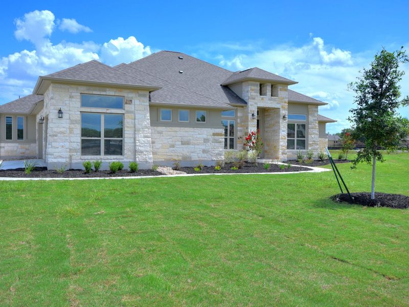 Representative exterior photo of a completed home built from the San Simeon I by Giddens Homes in Clearwater Ranch, Liberty Hill, TX (Image 54).