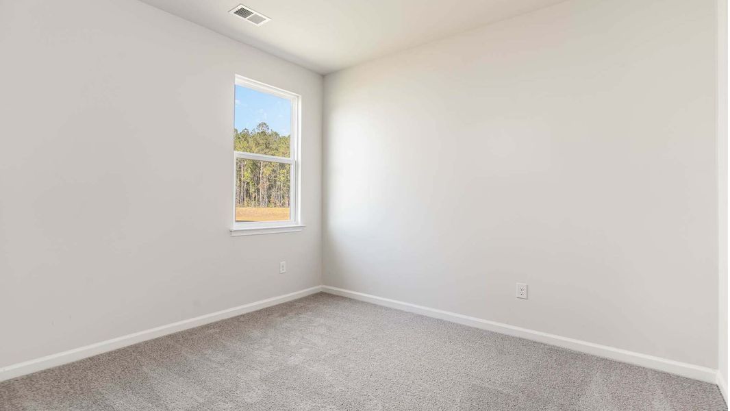 Representative unfurnished interior of a home built from the ARIA by D.R. Horton in Sandridge Park, Little River (Image 12).