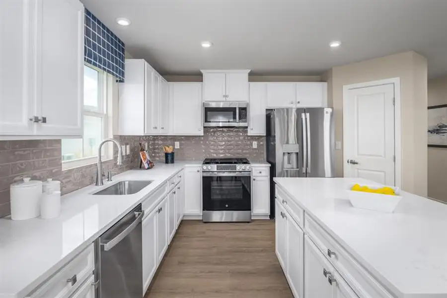 Furnished interior view inside a new home in Reidville Town Center Cottages, Duncan (Image 5).