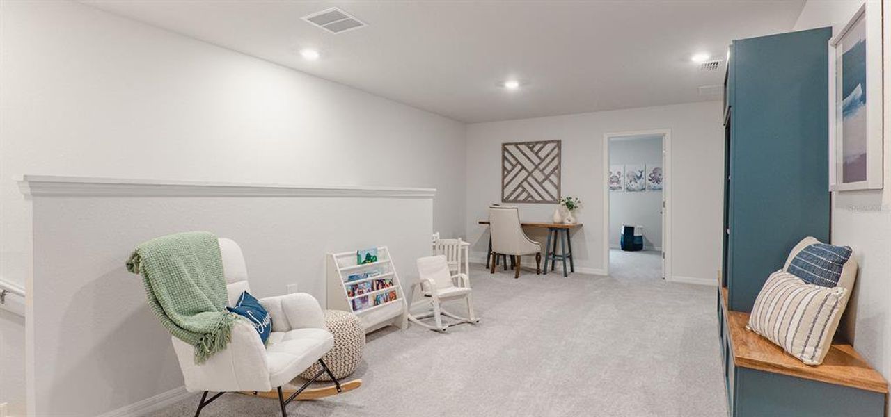 Furnished interior view inside a new home in Ralston Reserve at Siena, St. Cloud (Image 7).