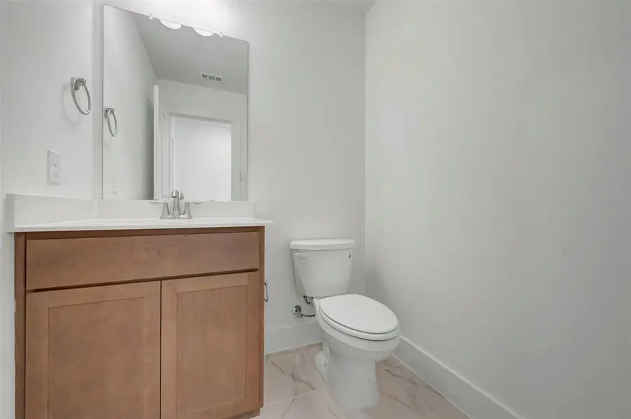 Furnished interior view inside a new home in Lily Creek at Sutton Fields, Aubrey (Image 11).