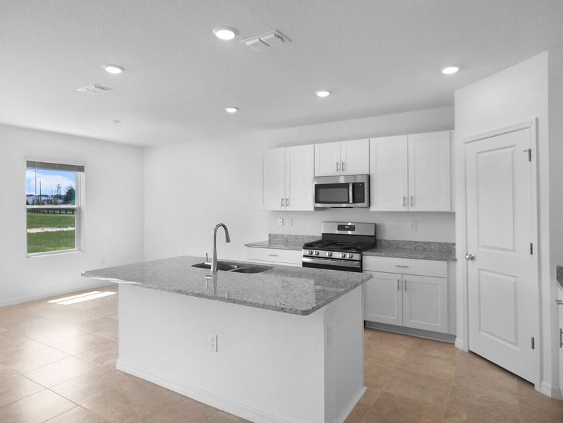 Representative furnished interior of a home built from the Azalea by Taylor Morrison in Waterstone, Groveland (Image 31).
