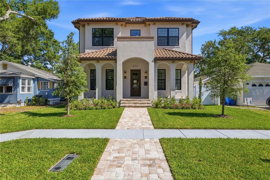 Front exterior of a new home in , St. Petersburg, FL, highlighting curb appeal (Image 27).