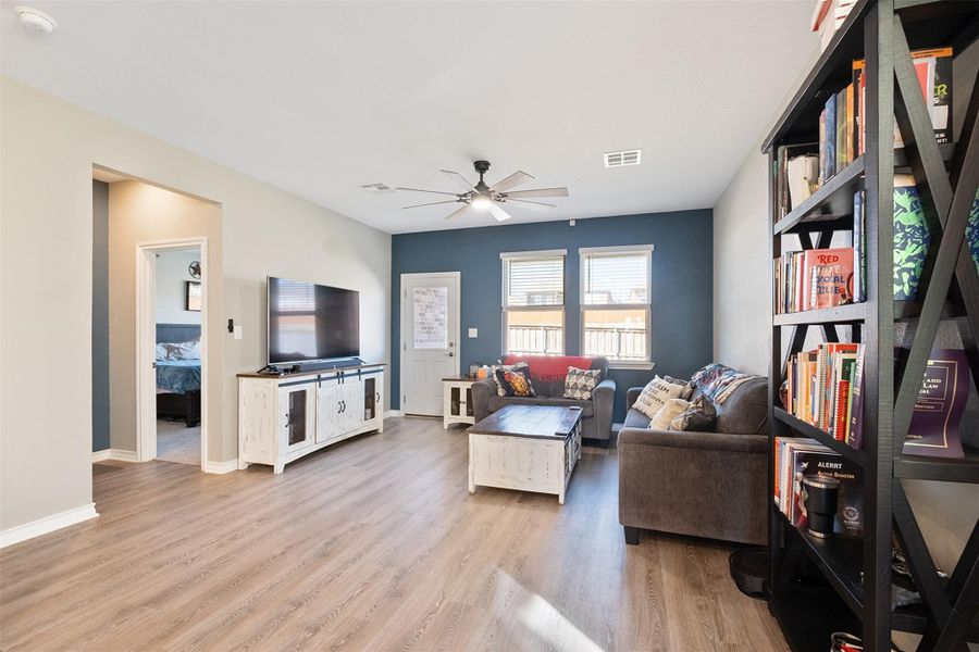 Spacious living room with plenty of light