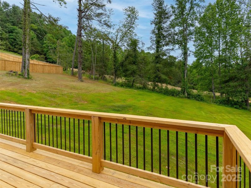 Back deck over looking spacious back yard