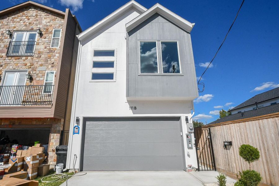Front exterior of a new home in , Houston, TX, highlighting curb appeal (Image 2).