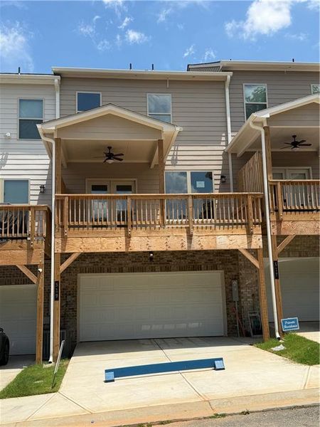 Exterior details and patio area of a home in Towns at Enclave, Lawrenceville (Image 16). Exterior details and patio area of a home in Towns at Enclave, Lawrenceville (Image 16).