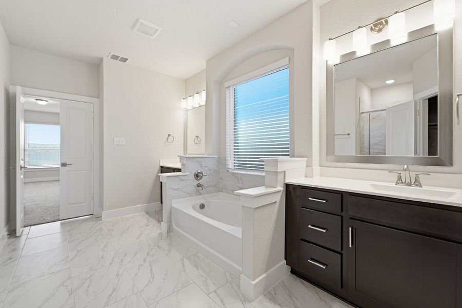 Furnished interior view inside a new home in The Woodlands at Medina Hills, Mico (Image 13). Furnished interior view inside a new home in The Woodlands at Medina Hills, Mico (Image 13).