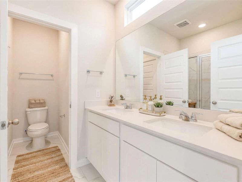 Furnished interior view inside a new home in Spring Branch Crossing, Conroe (Image 9).