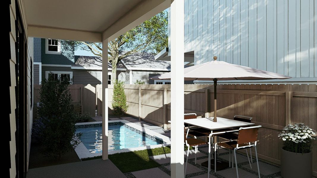 Covered patio with square paver stones and a rectangular swimming pool
