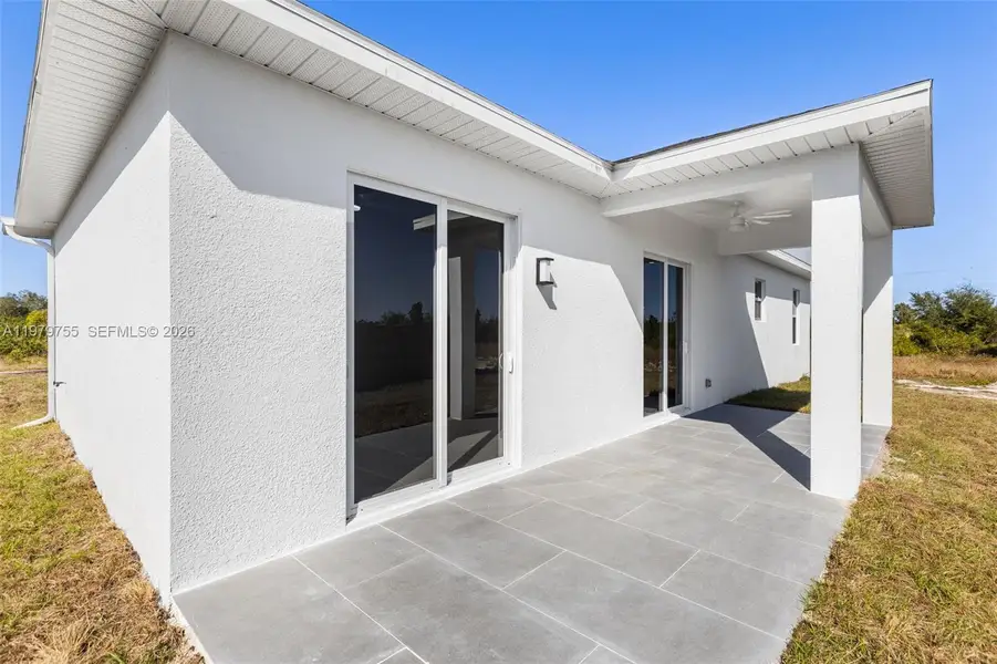 Exterior details and patio area of a home in , Lehigh Acres (Image 3).