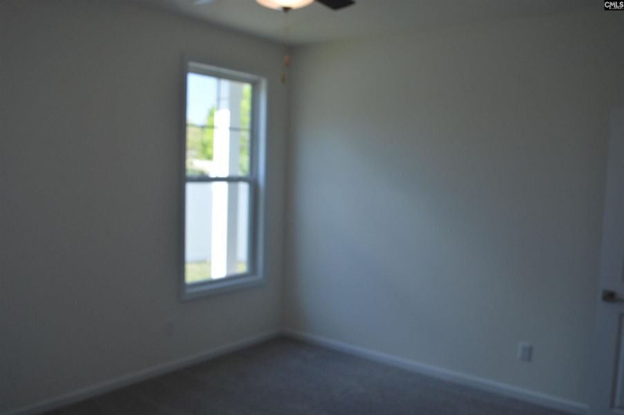Spacious, unfurnished interior of a new home in Bickley Station, Irmo (Image 16).
