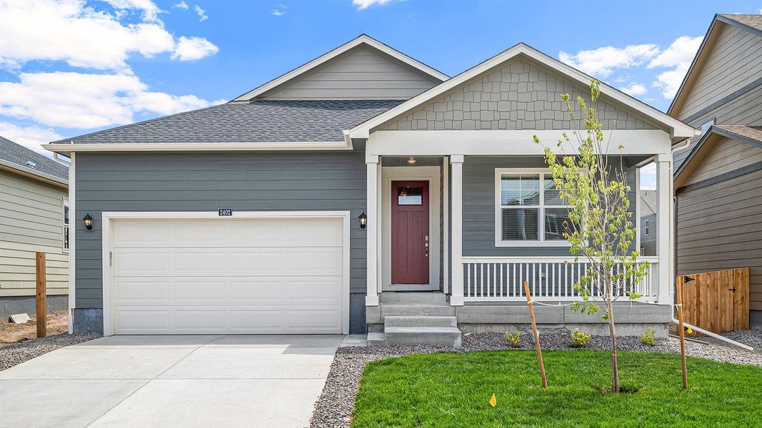 Front exterior of a new home in Silver Peaks, Lochbuie, CO, highlighting curb appeal (Image 1). Front exterior of a new home in Silver Peaks, Lochbuie, CO, highlighting curb appeal (Image 1).