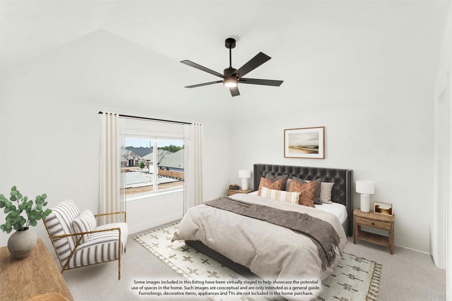 Bedroom with vaulted ceiling, ceiling fan, large window, and carpeted floor with sitting area
