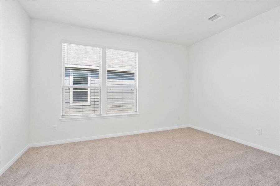 The Den offers a versatile space that seamlessly expands your living options—perfect for a home office, playroom, media space, or whatever suits your lifestyle.