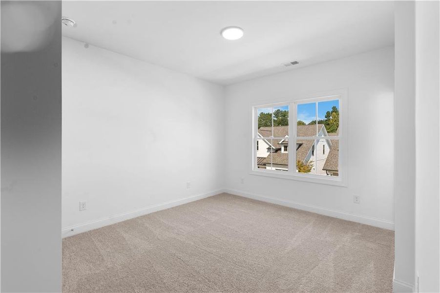 Spacious, unfurnished interior of a new home in Evanshire Townhomes, Duluth (Image 29).