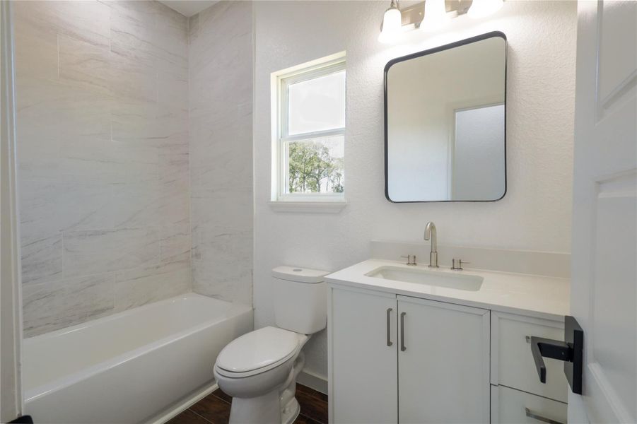 Furnished interior view inside a new home in , Conroe (Image 4).