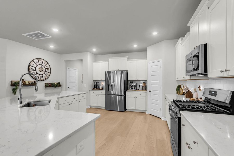 Furnished interior view inside a new home in Sweetgrass at Summers Corner: Arbor Collection, Summerville (Image 16).