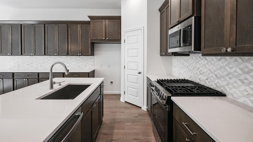 Furnished interior view inside a new home in Crosswinds 40', Kyle (Image 6).