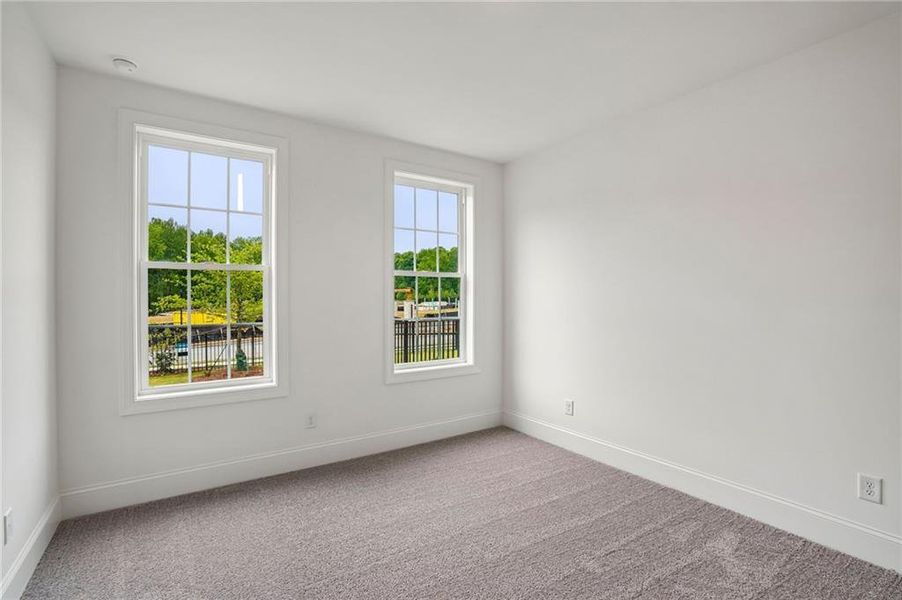 Spacious, unfurnished interior of a new home in Waterhaven, Cumming (Image 40).