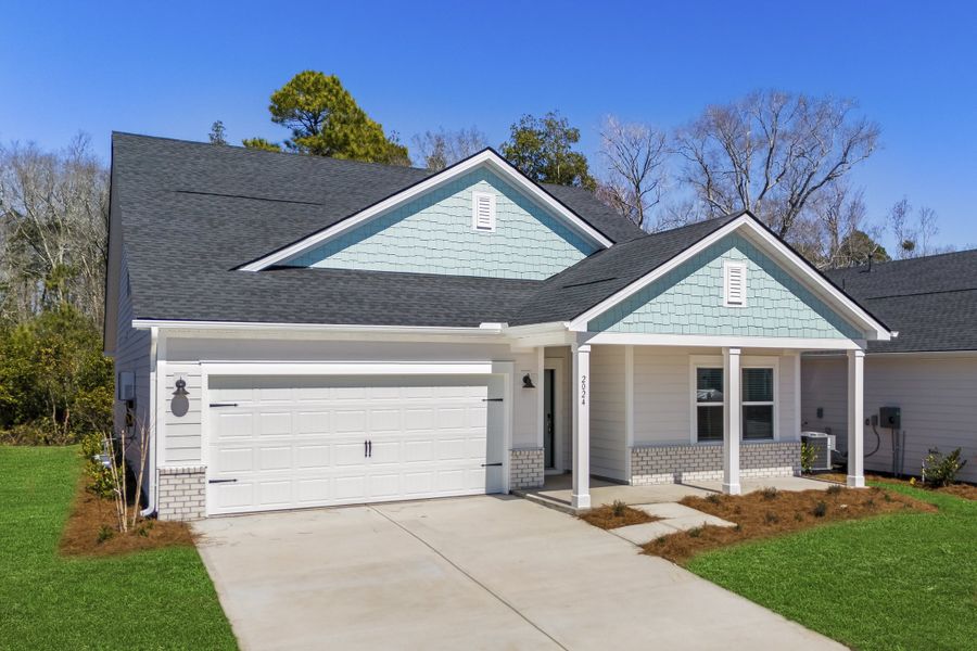 Front exterior of a new home in Waterside, Longs, SC, highlighting curb appeal (Image 23). Front exterior of a new home in Waterside, Longs, SC, highlighting curb appeal (Image 23).