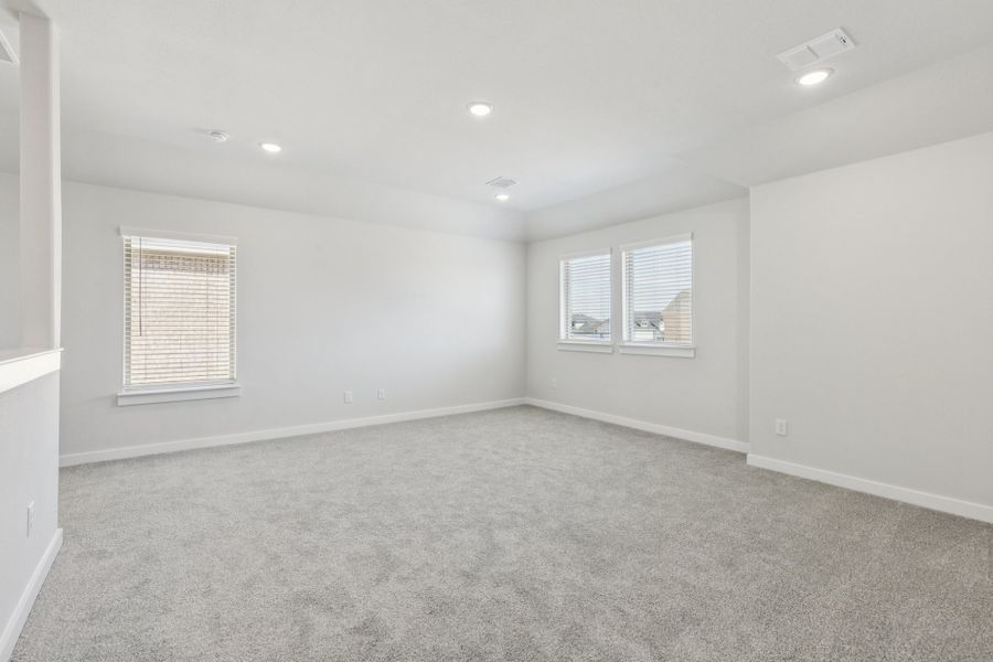 Game room in the Masters home plan by Trophy Signature Homes – REPRESENTATIVE PHOTO Game room in the Masters home plan by Trophy Signature Homes – REPRESENTATIVE PHOTO