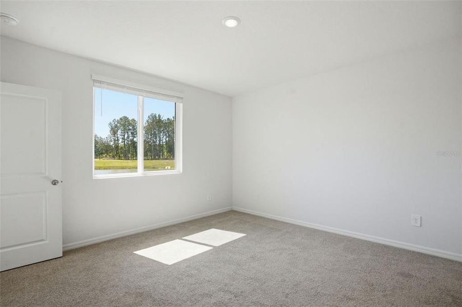 Spacious, unfurnished interior of a new home in Leyland Preserve - Premier Series, Brooksville (Image 50).