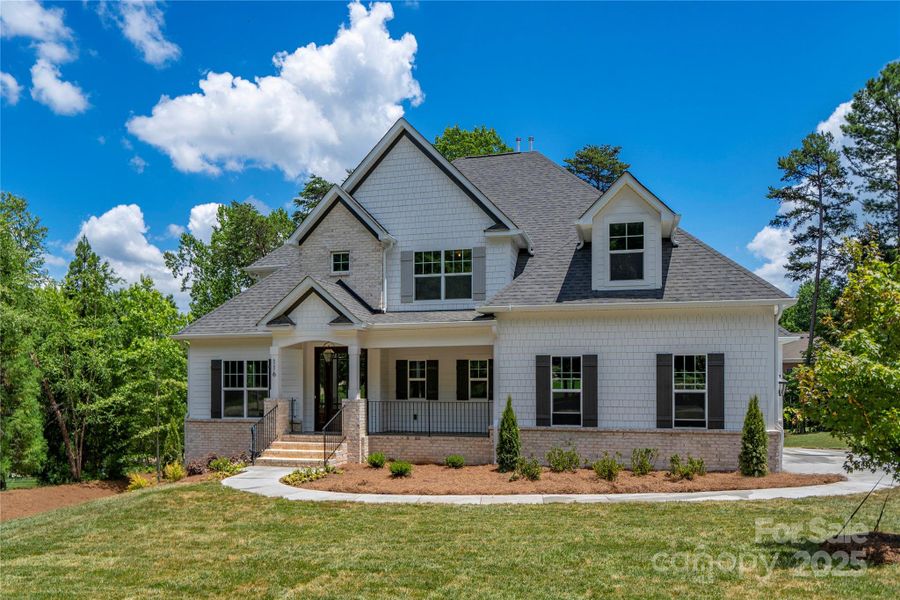 Front exterior of a new home in , Mooresville, NC, highlighting curb appeal (Image 2). Front exterior of a new home in , Mooresville, NC, highlighting curb appeal (Image 2).