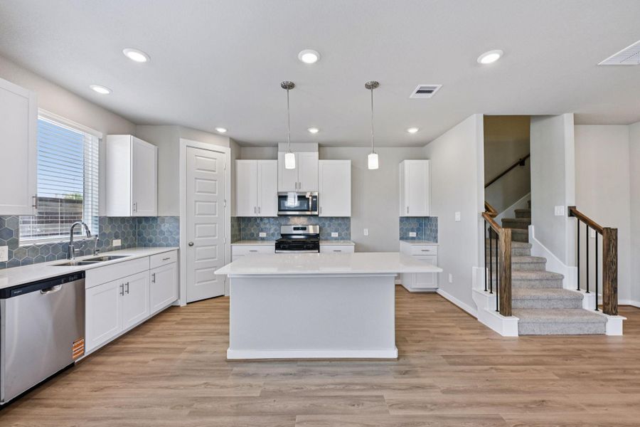 Photo is not of the actual home, but is an inspirational photo of builder’s model home and may depict options, furnishings, and/or decorator features that are not included