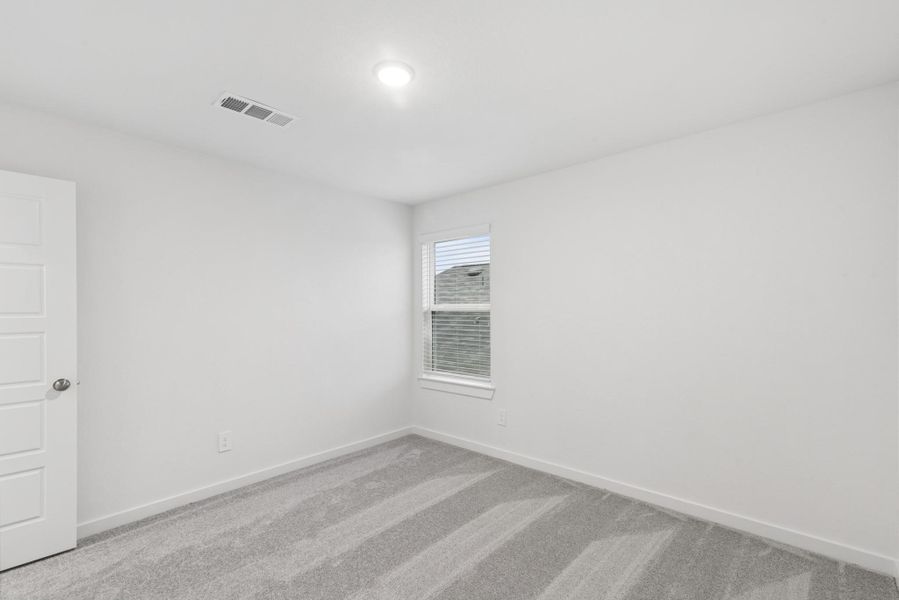 Spacious, unfurnished interior of a new home in Pinewood at Grand Texas, New Caney (Image 16).