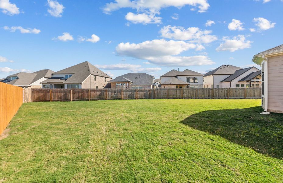 Exterior details and patio area of a home in Santa Rita Ranch, Liberty Hill (Image 29).